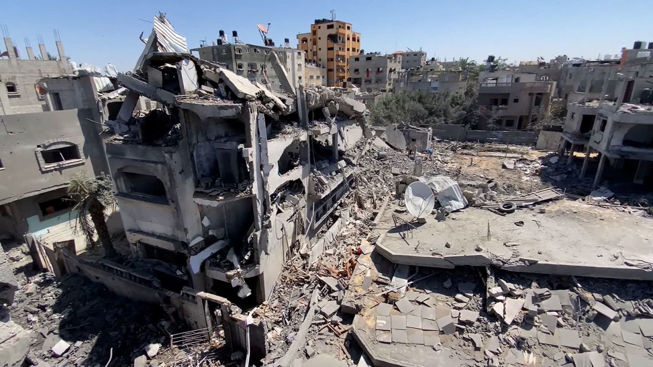 Video of the aftermath shot for CNN shows heavy destruction, with debris and rubble from destroyed buildings strewn along the road.