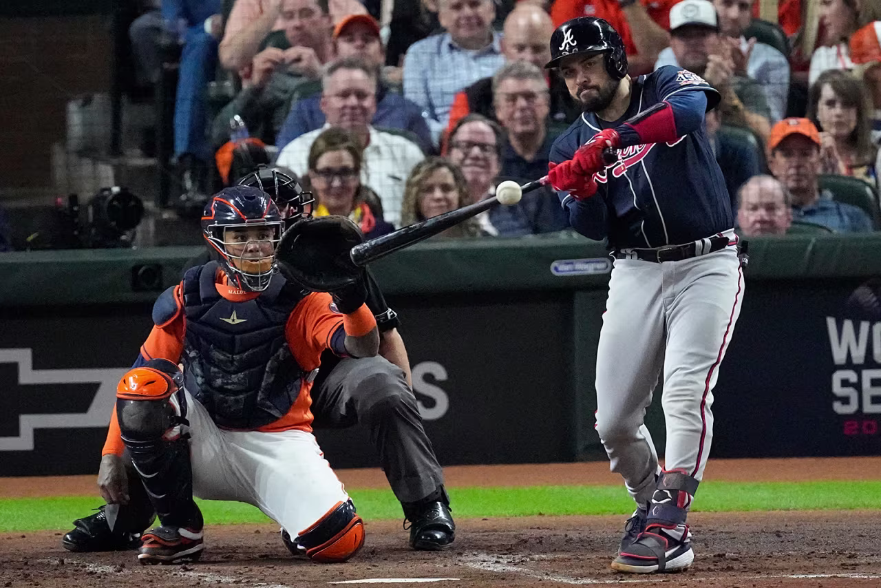 Atlanta Braves' Travis d'Arnaud hits a home run during the second inning.