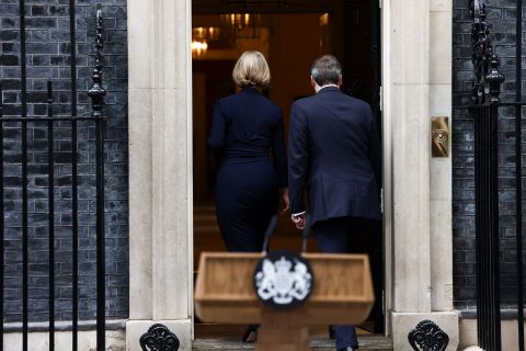 British Prime Minister Liz Truss walks with her husband Hugh O'Leary, after announcing her resignation, outside Number 10 Downing Street, London, on October 20.