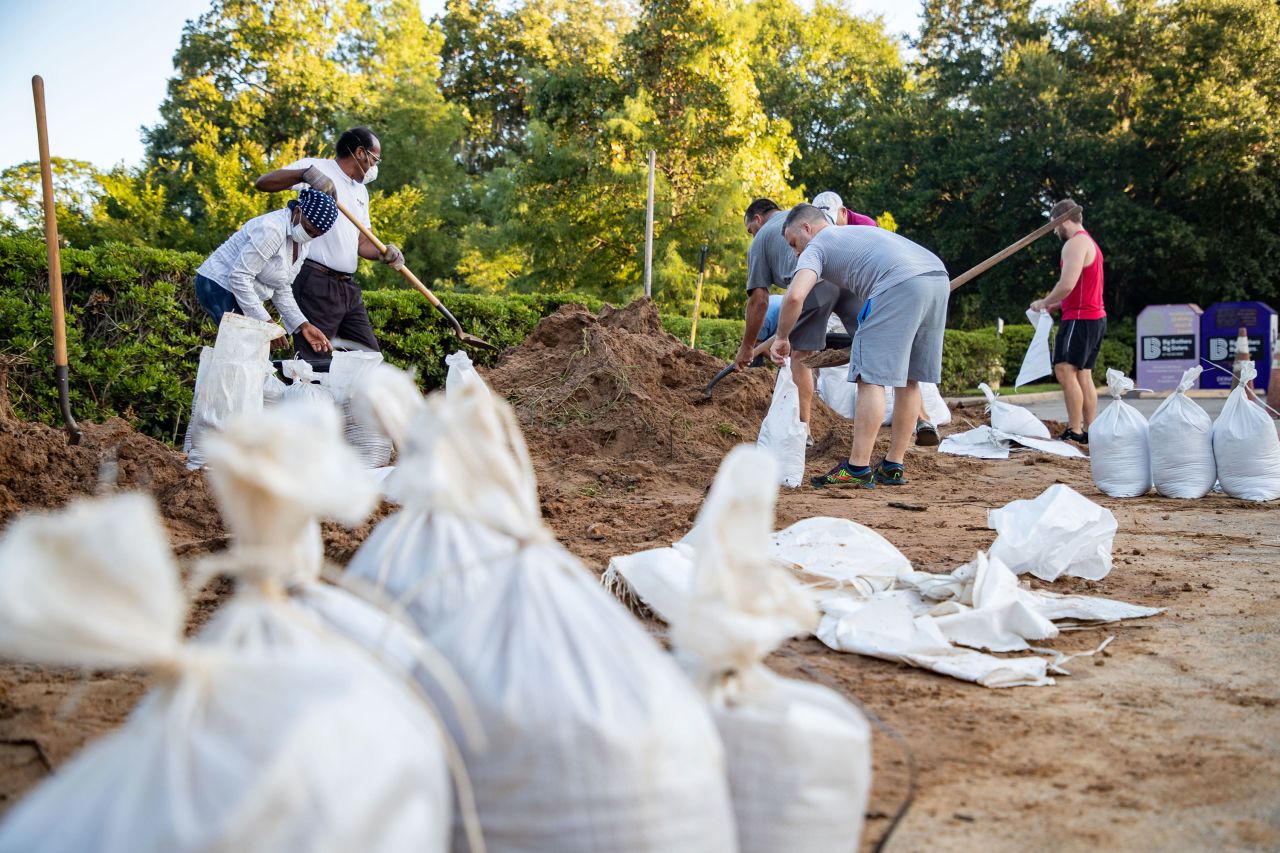 Tallahassee residents fill sandbags as they prepare Hurricane Idalia.