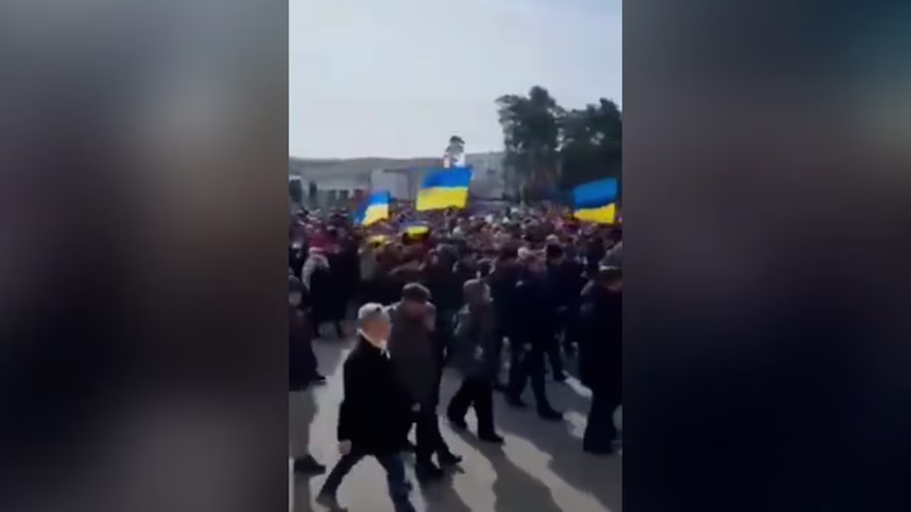 Earlier Saturday, hundreds of locals amassed in the city square in a protest following the arrival of Russian troops. 
