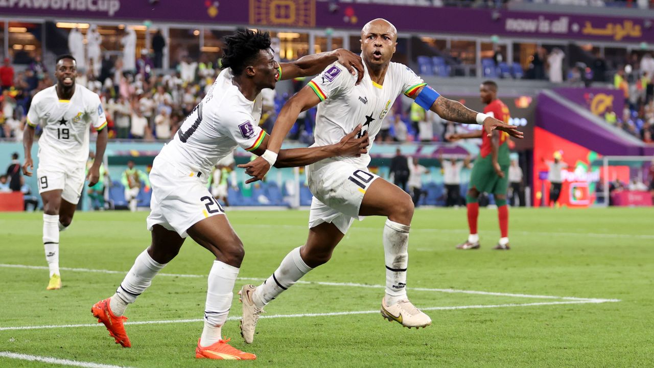 Ghana's Andre Ayew, right, celebrates with Mohammed Kudus after tying the match at 1-1.