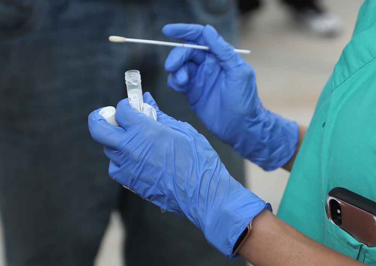 Dr. Natalia Echeverri,?prepares a swab to gather a sample from the nose of a homeless person to test for Covid-19 on April 17, in Miami, Florida.