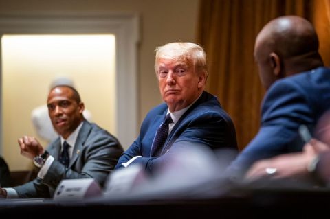 President Donald Trump listens during a meeting in the Cabinet Room of the White House May 18 in Washington.