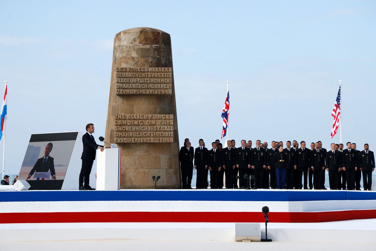 France's President Emmanuel Macron delivers a speech during the International commemorative ceremony at Omaha Beach marking the 80th anniversary of the World War II