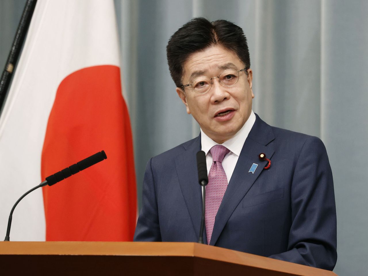 Japanese Chief Cabinet Secretary Katsunobu Kato attends a news conference in Tokyo, on Dec. 8.
