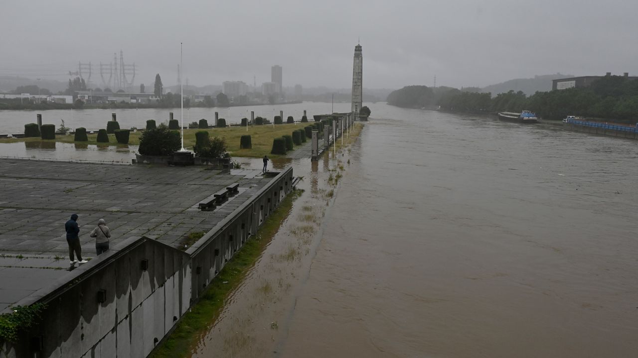 Illustration shows floods at the Monsin dam bridge in Liege after heavy rainfall on Thursday.