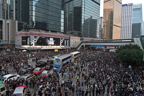 Protesters spill onto Harcourt Road as they attend a rally against a controversial extradition law proposal in Hong Kong on June 16
