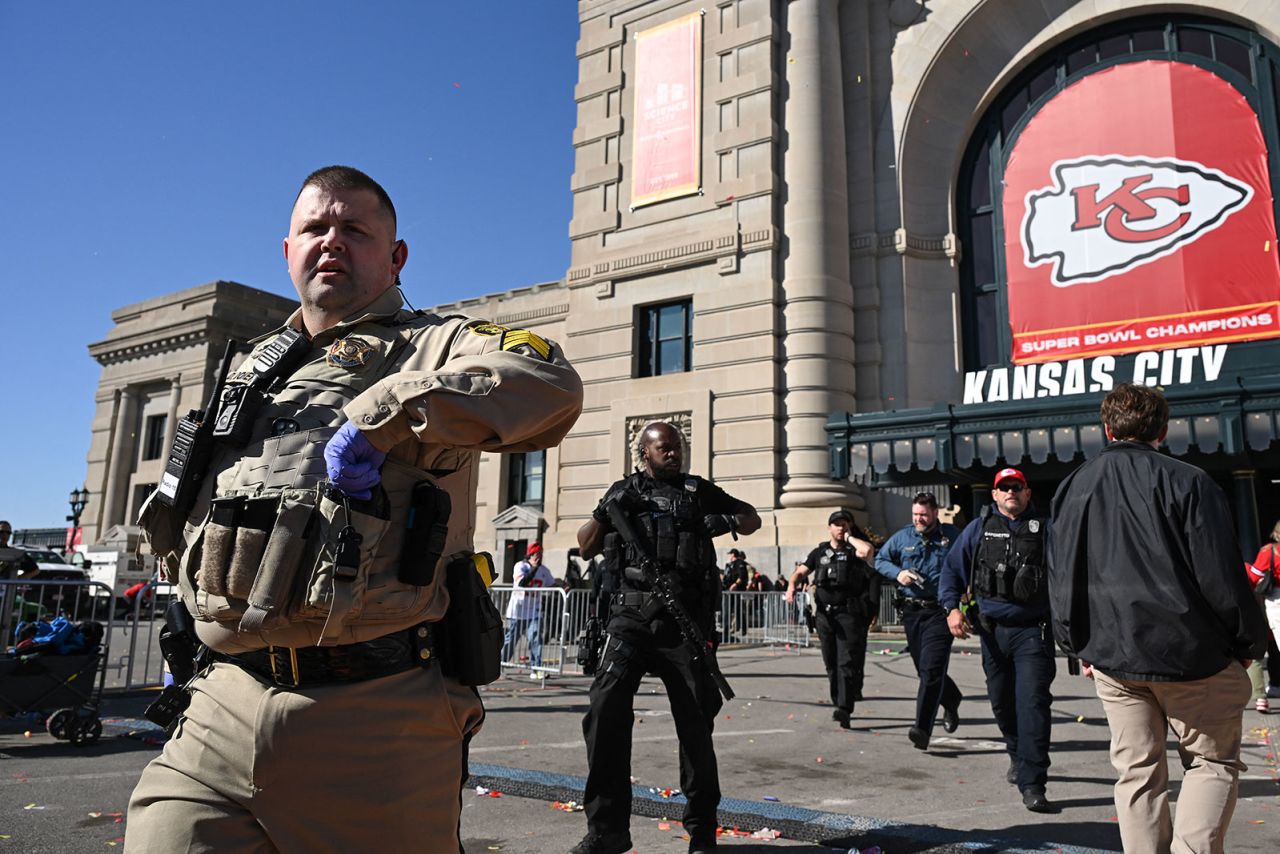 Police respond after shots were fired near the Kansas City Chiefs' Super Bowl LVIII victory parade on Wednesday in Kansas City, Missouri. 