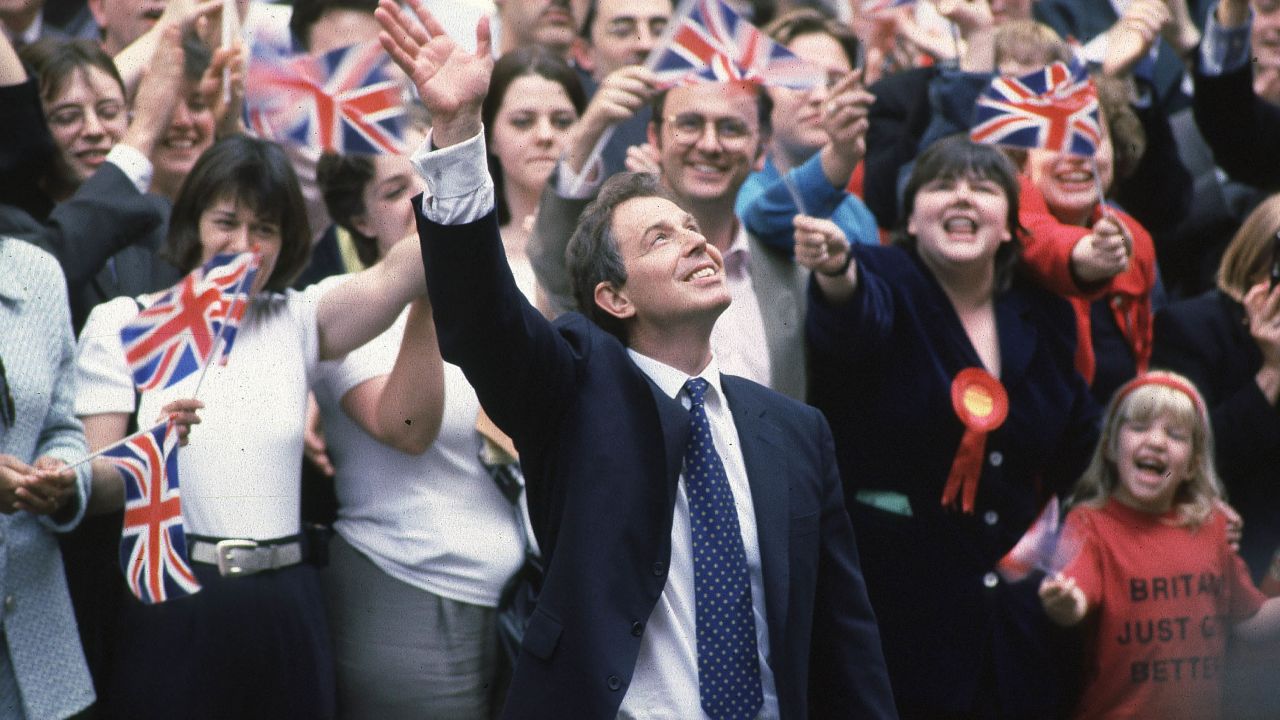 Tony Blair arrives in Downing Street in London, following his 1997 election victory. 