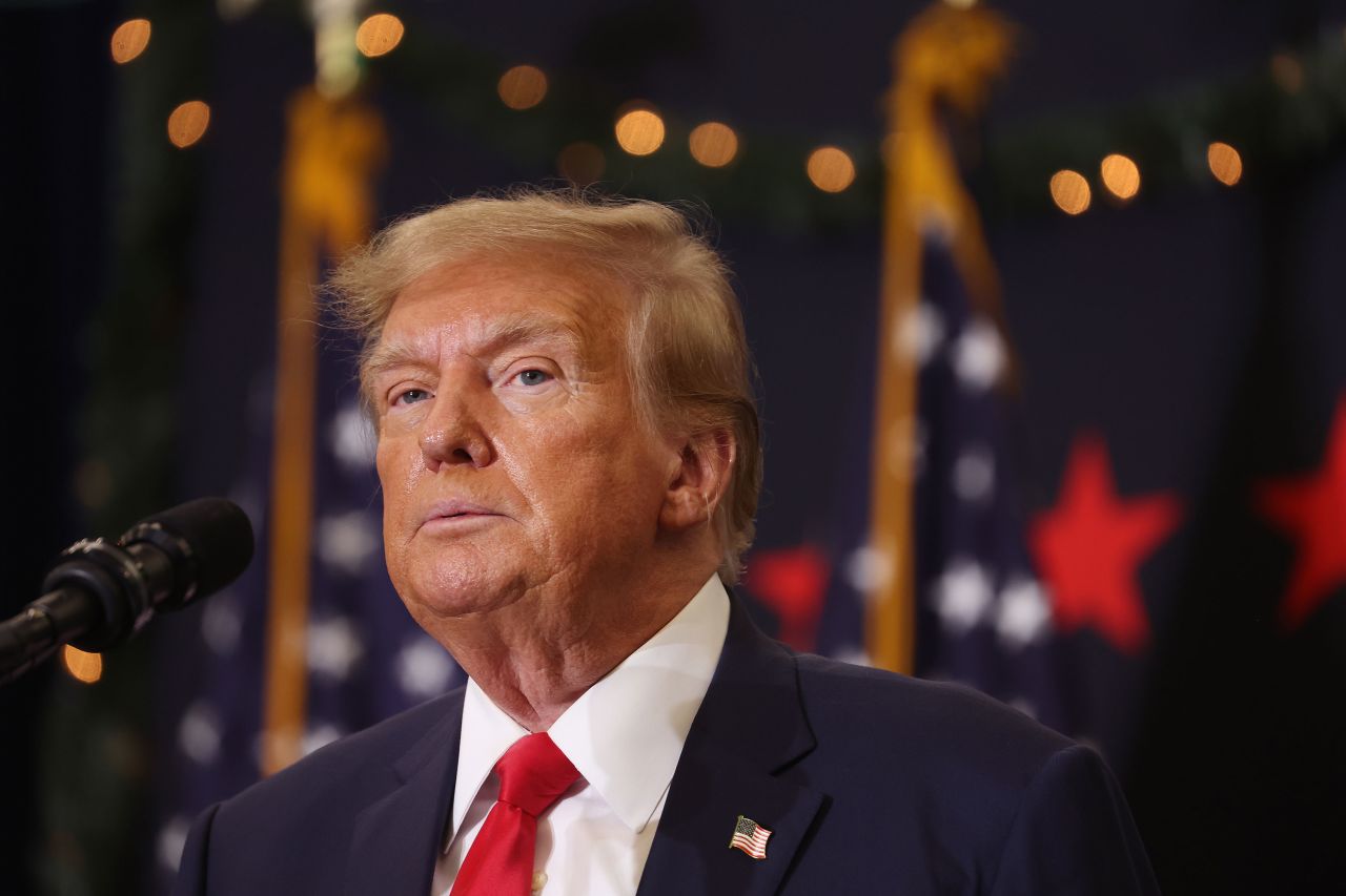 Former President Donald Trump looks on during a campaign event in December 19 in Waterloo, Iowa.