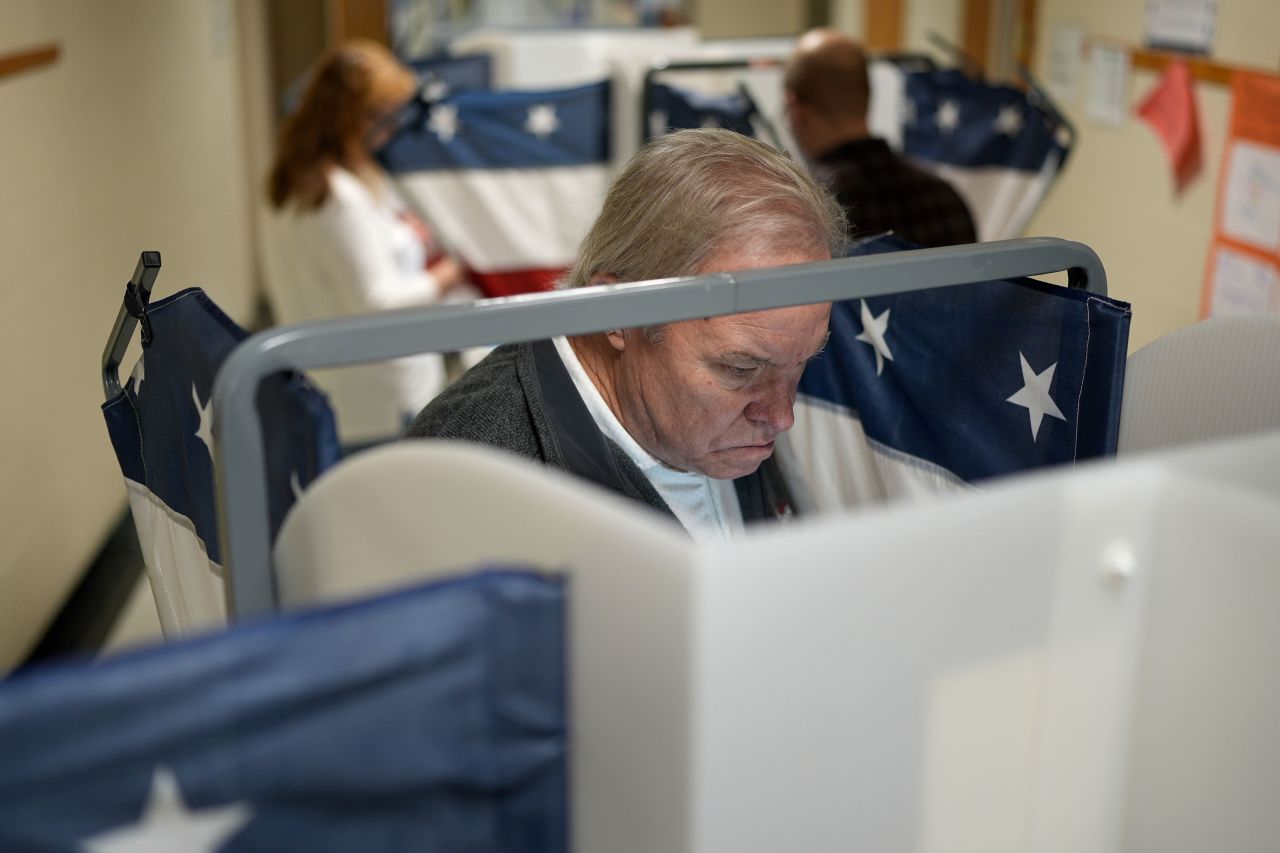 Greg Welton marks his ballot at a polling place in Nashville on Tuesday.