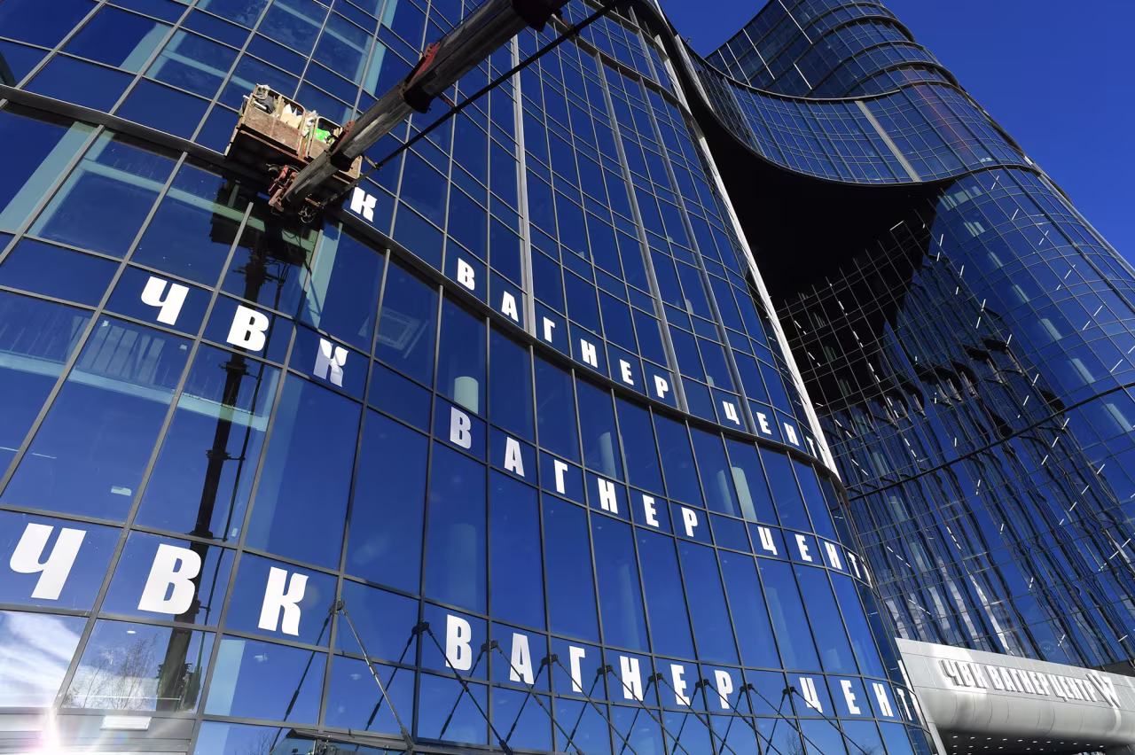 Workers put final touches on the "PMC Wagner Centre", associated with businessman Yevgeny Prigozhin, the founder of the Wagner PMC (private military company) mercenary group, ahead of its opening in Saint Petersburg, Russia, on October 31.