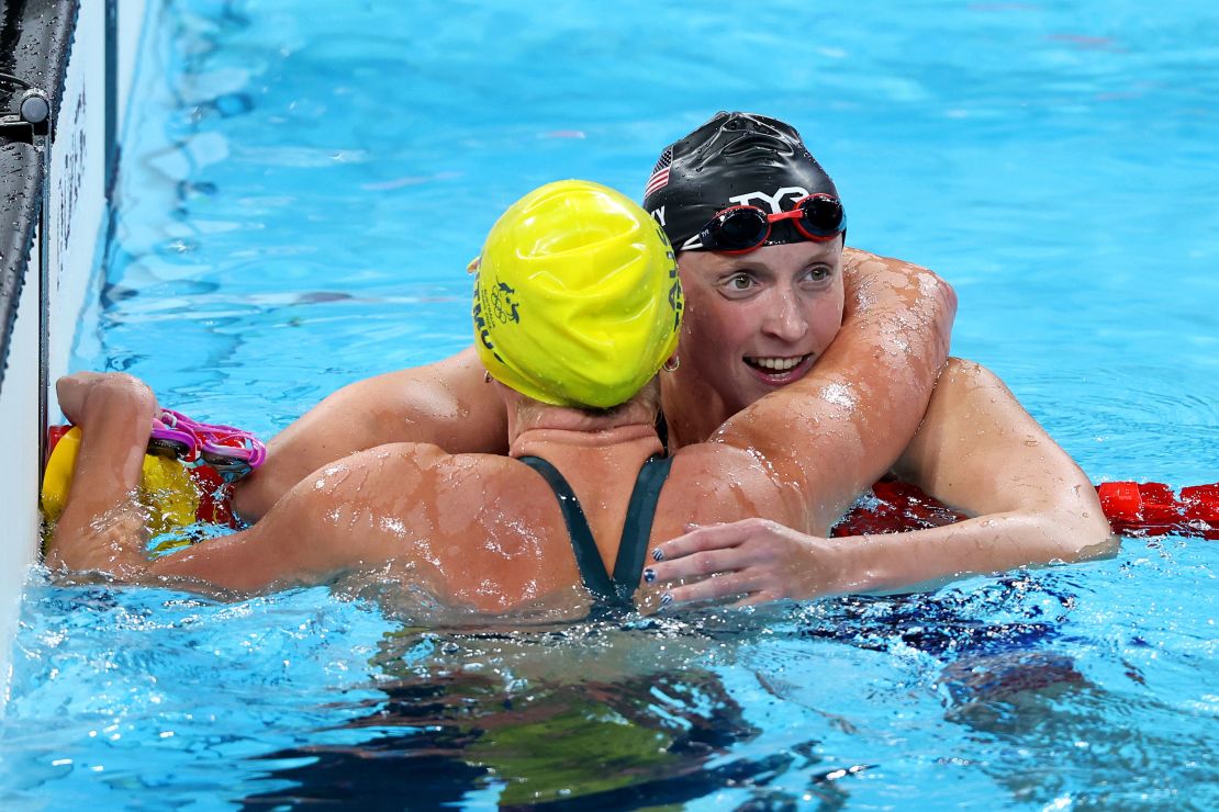 Katie Ledecky embraces Australia's Titmus after the race.