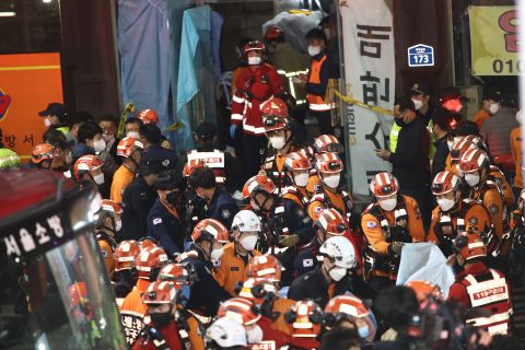 Emergency services treat injured people on Saturday night in Seoul.