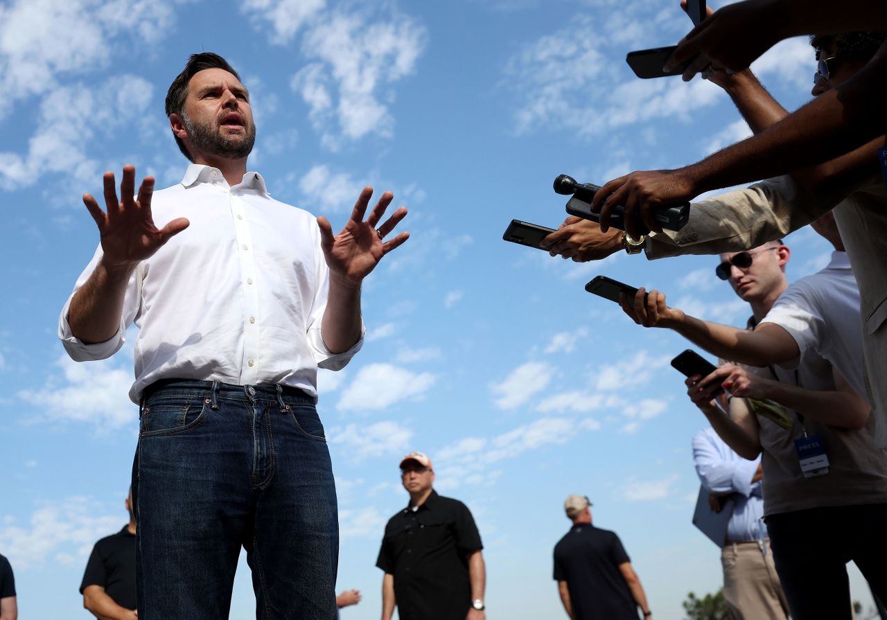 Sen. JD Vance speaks to reporters in front of the border wall with Mexico on September 6 in San Diego, California. 