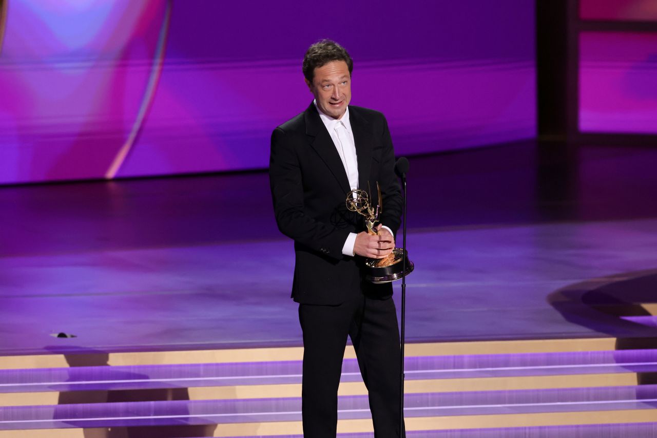 Ebon Moss-Bachrach accepts the award for outstanding supporting actor in a comedy series.?