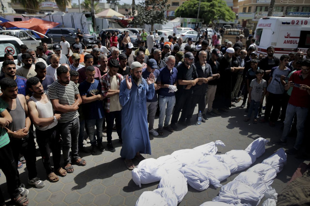 Palestinians mourn their relatives who were killed by an Israeli bombardment at Al-Aqsa Martyrs Hospital in Deir al-Balah, Gaza, on June 8.