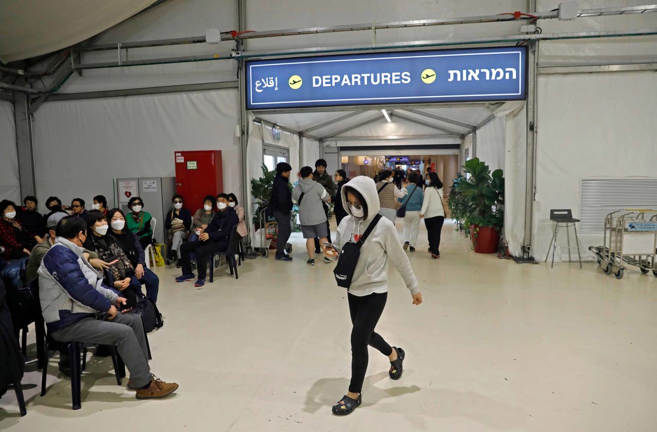 South Korean tourists leaving Israel are pictured at a pavillon separated from the main terminal of Ben Gurion International Airport near Tel Aviv on Monday.