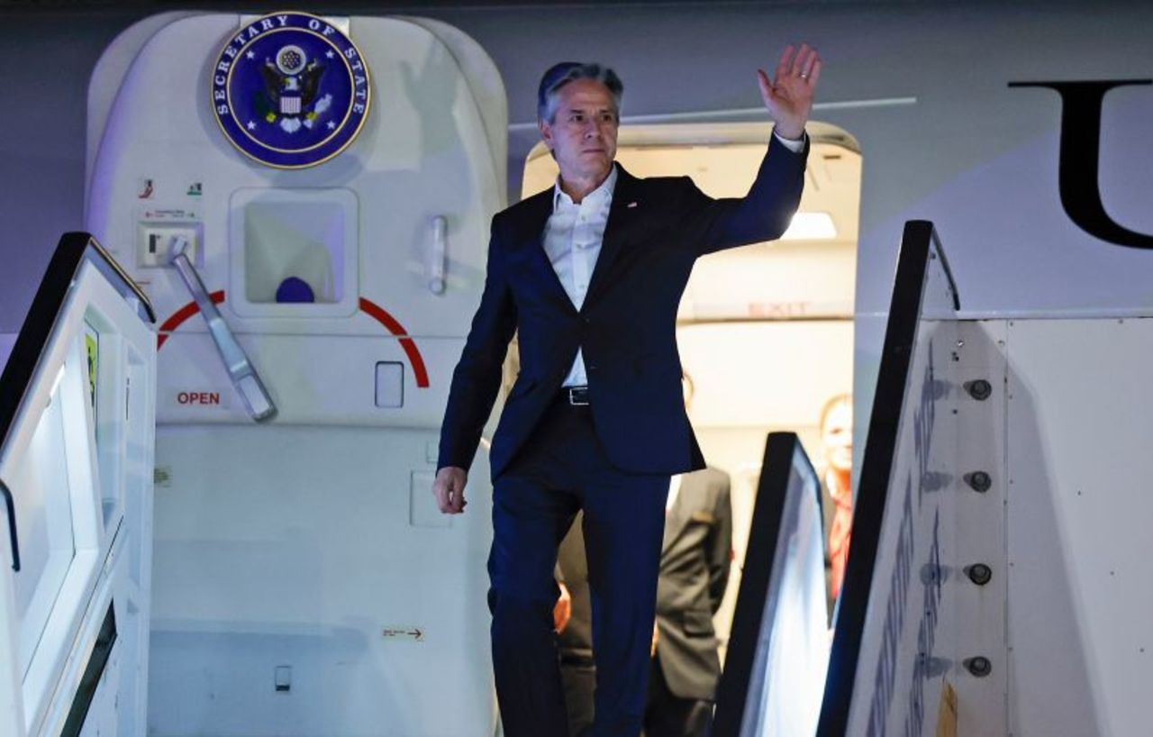 Antony Blinken gestures as he arrives in Tel Aviv, Israel, on January 8.