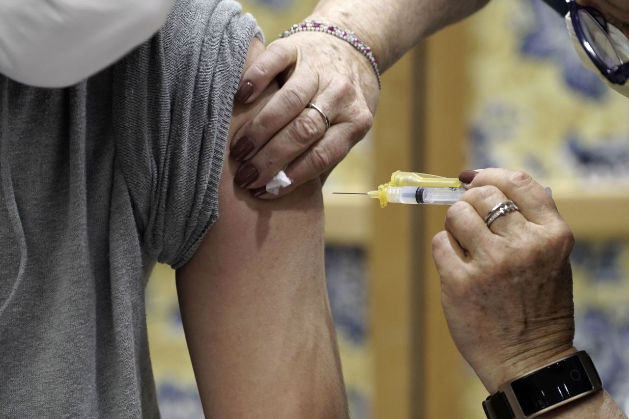 A person receives the Moderna Covid-19 vaccine in Tucson, Arizona, on January 15.