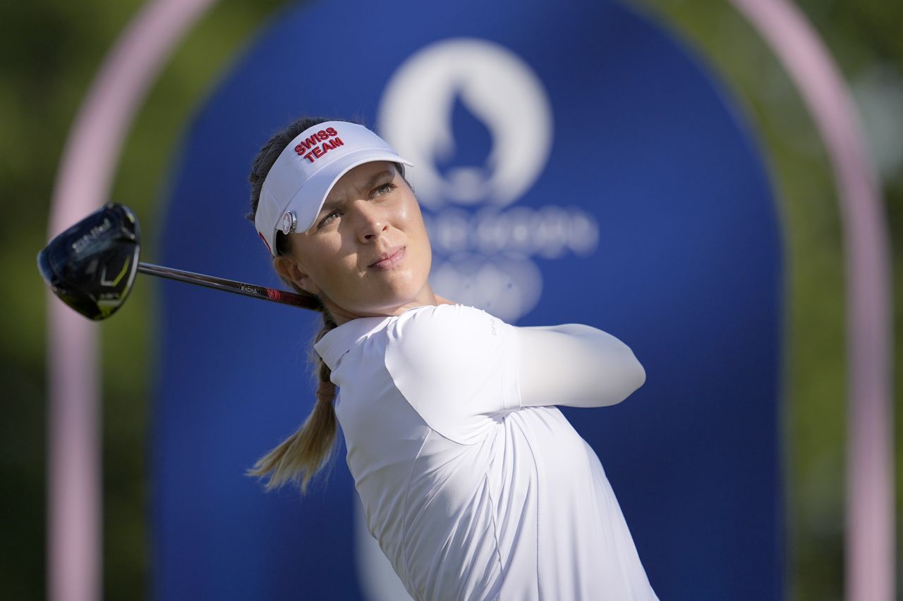 Morgane Metraux of Switzerland hits her shot from the 4th tee during the second round of the women's golf event at the 2024 Summer Olympics, on August 8, at Le Golf National, in Saint-Quentin-en-Yvelines, France. 