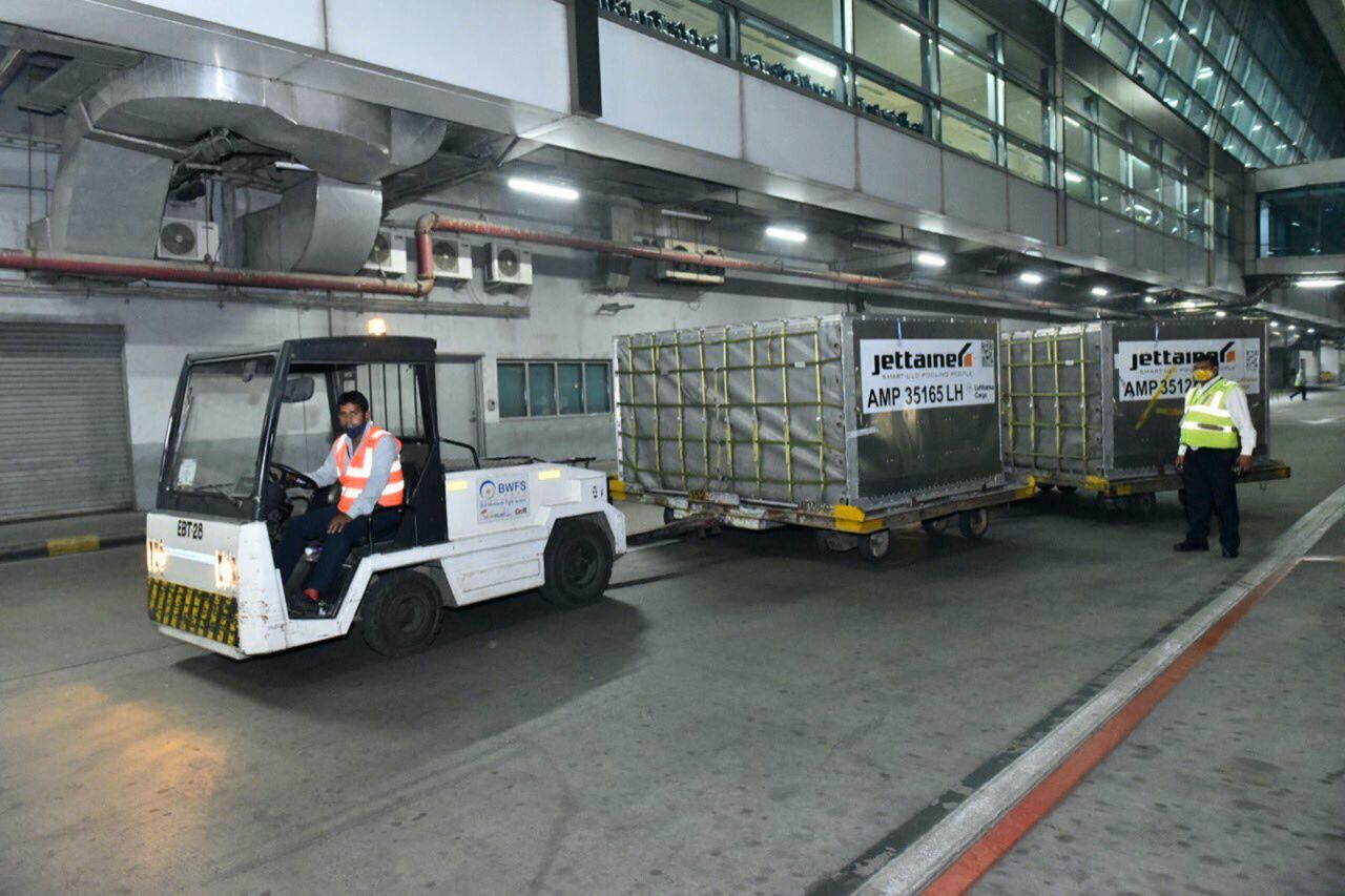 This photograph released by the Indian External Affairs Ministry shows a shipment containing 120 oxygen concentrators that arrived in India from the UK on April 29.