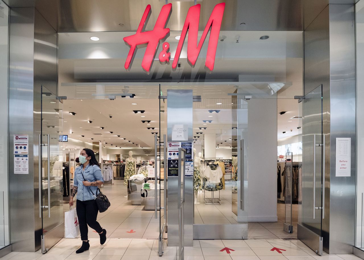 A person leaves an H&M store on June 18 in San Francisco.