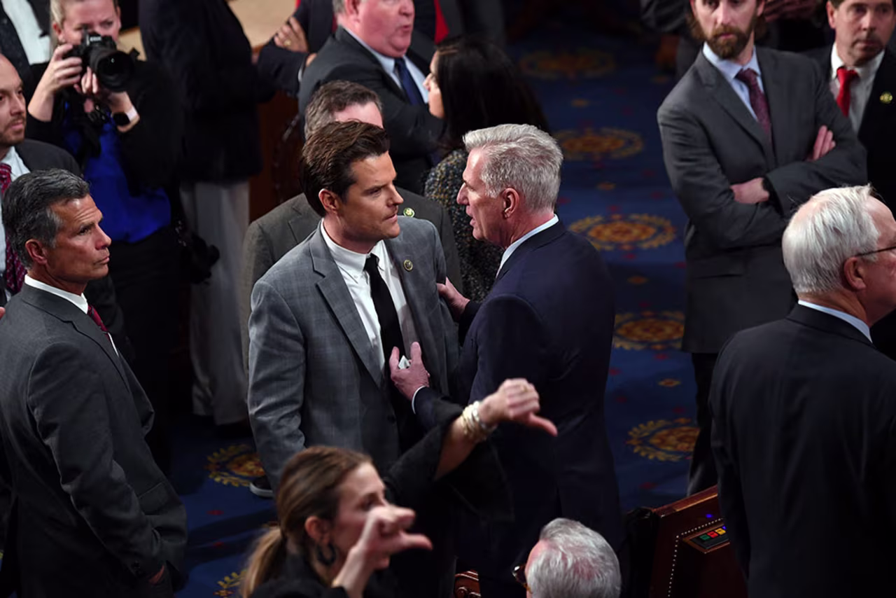 McCarthy speaks to US Rep. Matt Gaetz on Friday night. McCarthy confronted Gaetz over his "present" vote on the failed 14th ballot.