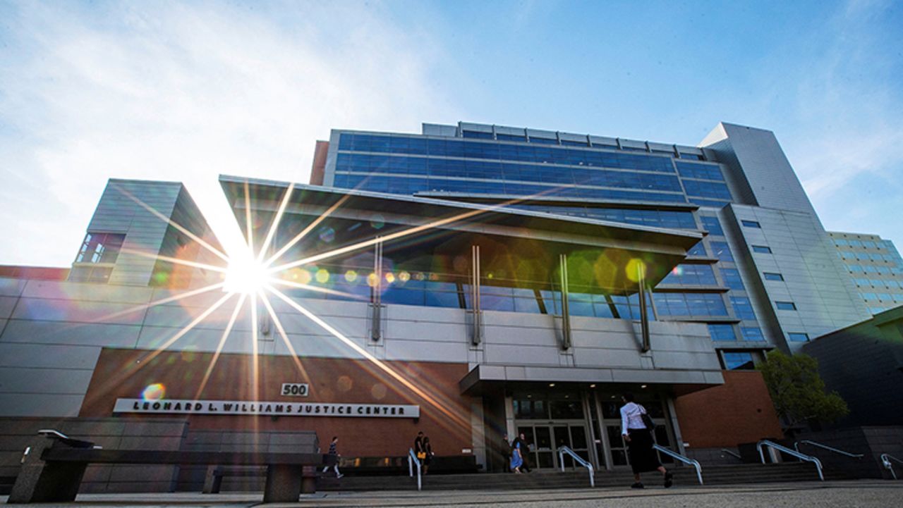 People arrive at the Leonard L. Williams Justice Center in Wilmington, Delaware, on April 14. 