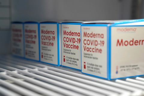 Boxes of Moderna COVID-19 vaccine are stored in a refrigerator at an ambulance company in Santa Fe Springs, California, on January 9.