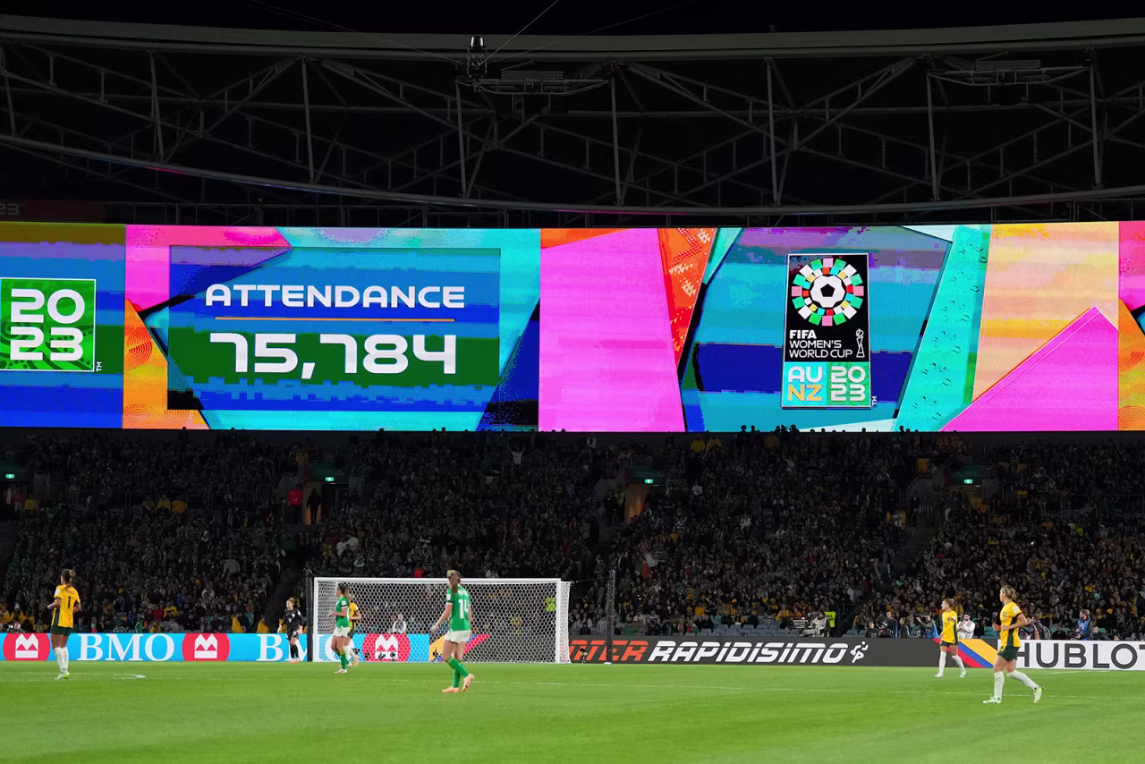 Screens show the attendance number of the match between Australia and Ireland on July 20. 