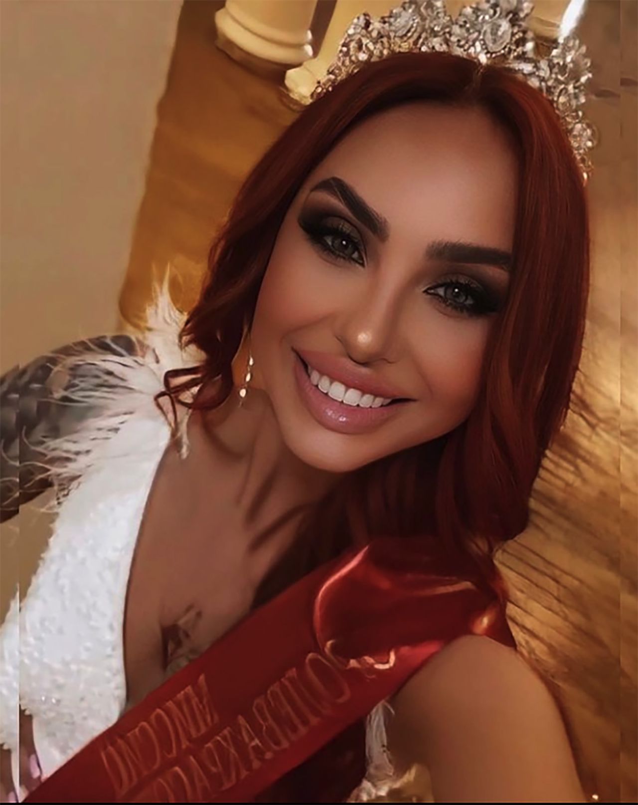 The winner of Miss Crimea 2022 Olga Valeeva poses for an Instagram selfie.