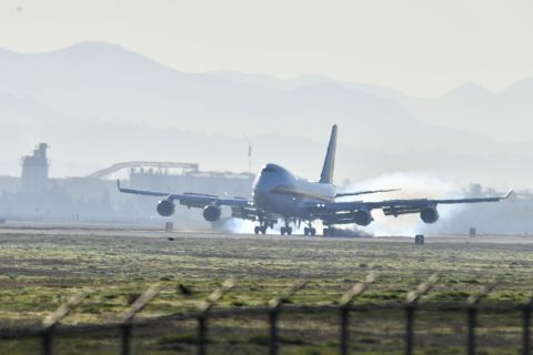 A charter flight from Wuhan, China, carrying approximately 200 U.S. citizens, lands at March Air Reserve Base in Riverside, California, on Wednesday, January 29.