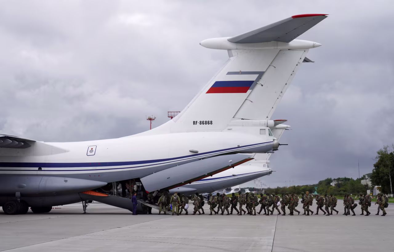 Russian paratroopers board a plane as they take part in ZAPAD 2021 in Kaliningrad region, Russia, last September.