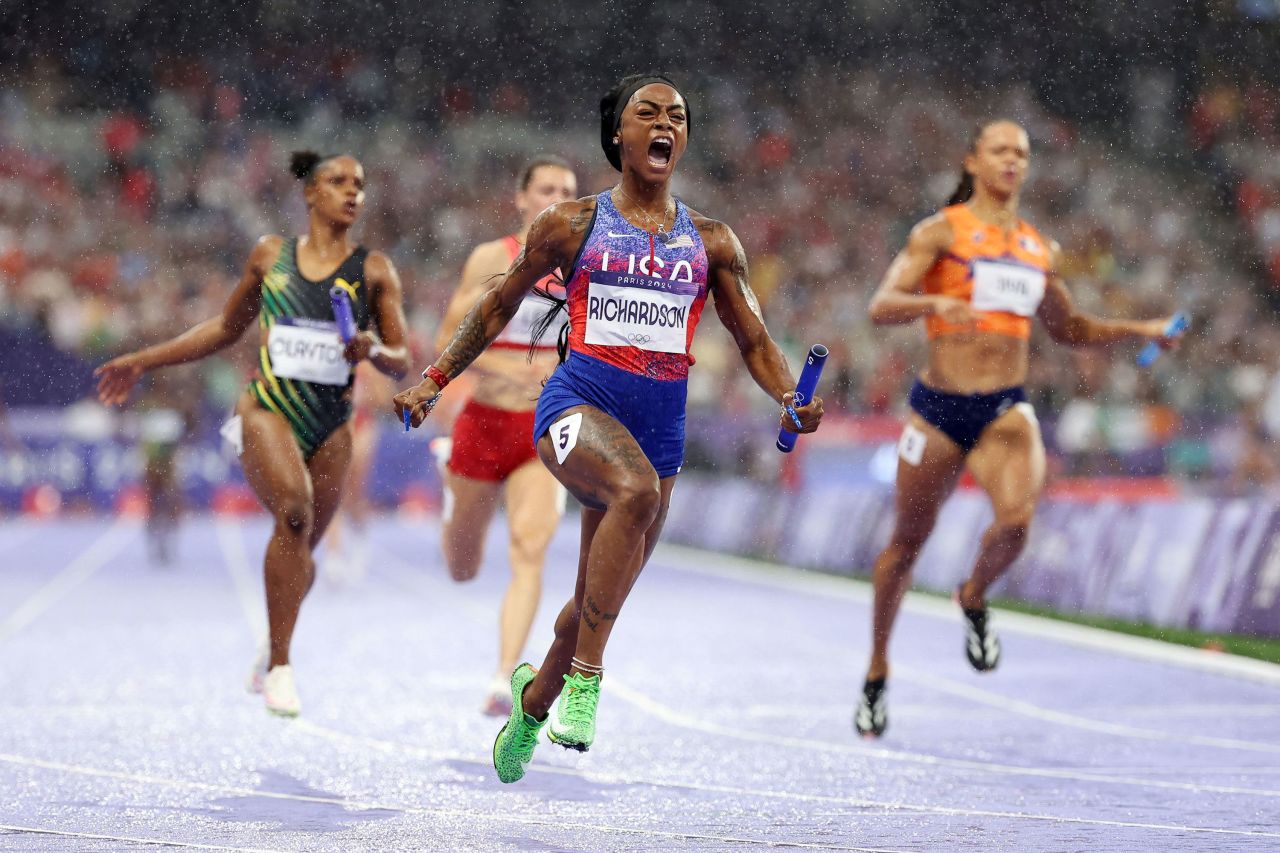 US sprinter Sha'Carri Richardson celebrates after crossing the finish line to win gold in the women's 4x100m relay on August 9. 