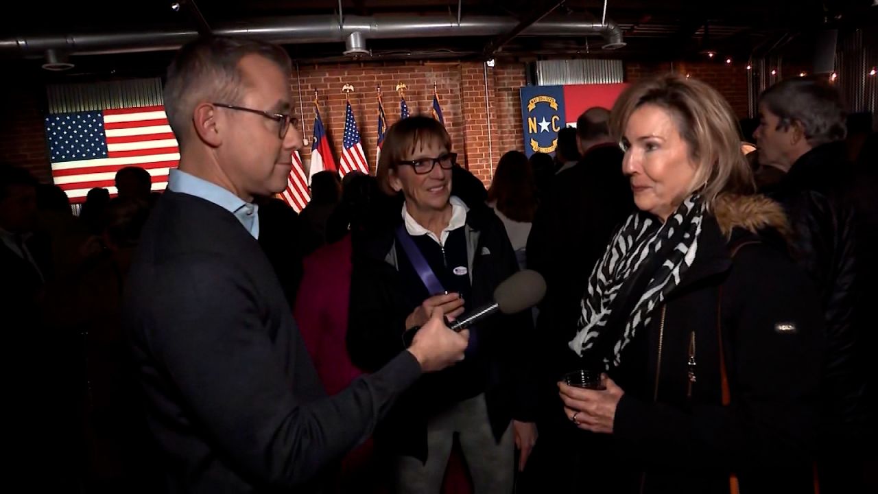 Stacey Van Gronigen, right, and Kim Brand, center, speak with CNN's Jeff Zeleny.