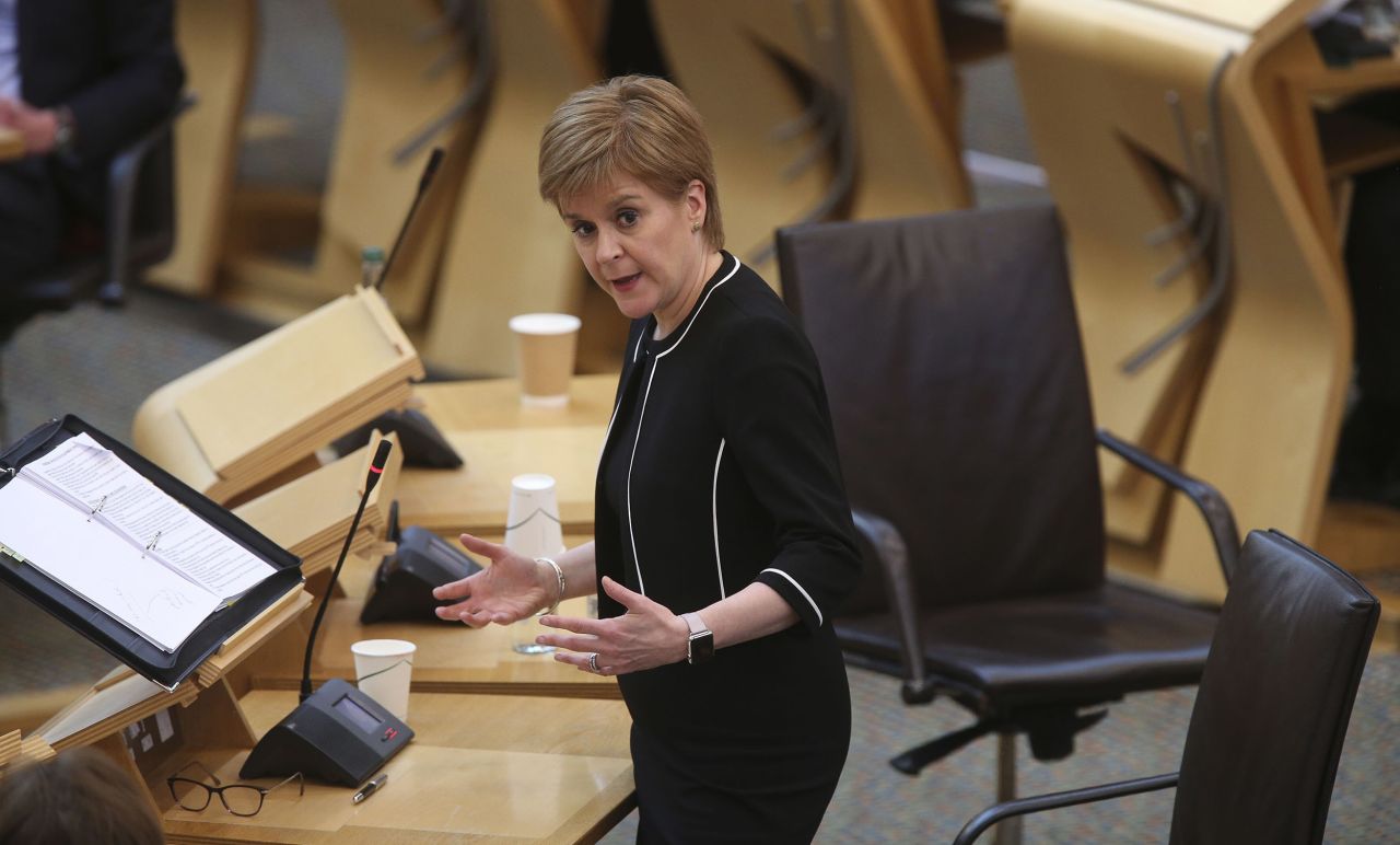 Scotland's First Minister Nicola Sturgeon speaks during First Minster's Questions (FMQ's) in the debating chamber of the Scottish Parliament in Edinburgh on April 28. 