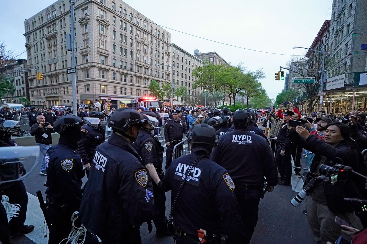 NYPD officers gather near Columbia University in New York on Tuesday. 