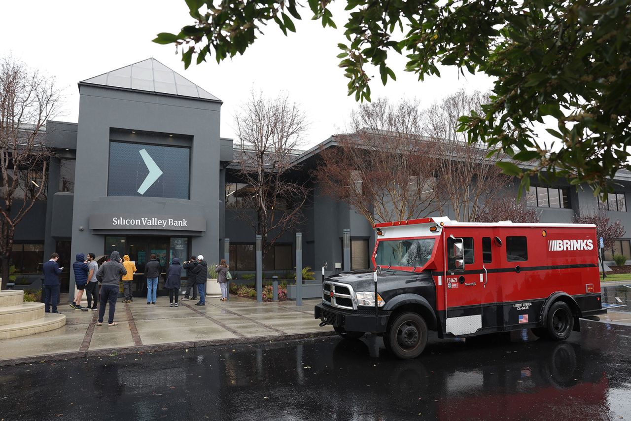 A Brinks armored truck sits parked in front of the shuttered Silicon Valley Bank?headquarters on March 10 in Santa Clara, California. 