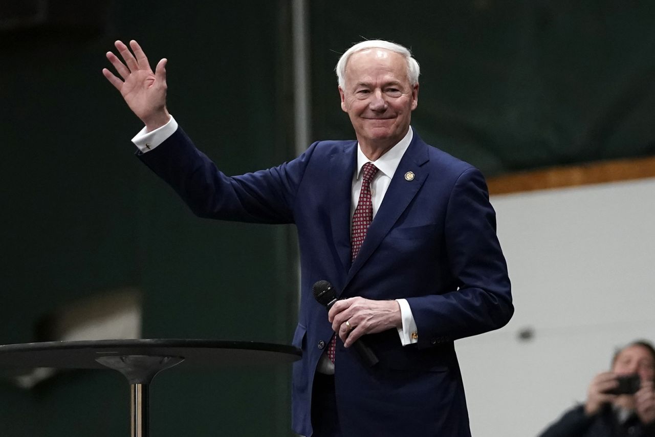 Republican presidential candidate former Arkansas Gov. Asa Hutchinson speaks at a caucus site at Horizon Events Center, in Clive, Iowa, Monday, Jan. 15.