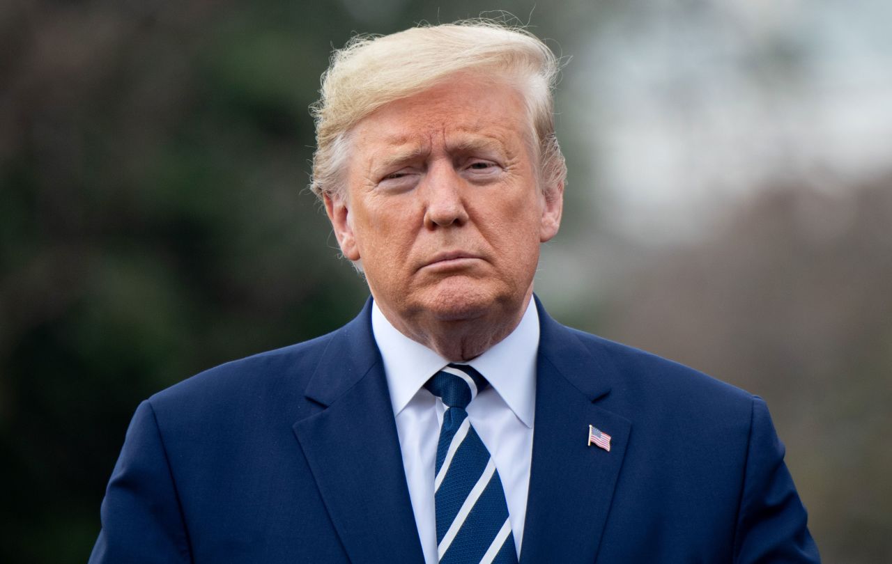 President Donald Trump walks outside the White House on March 3.