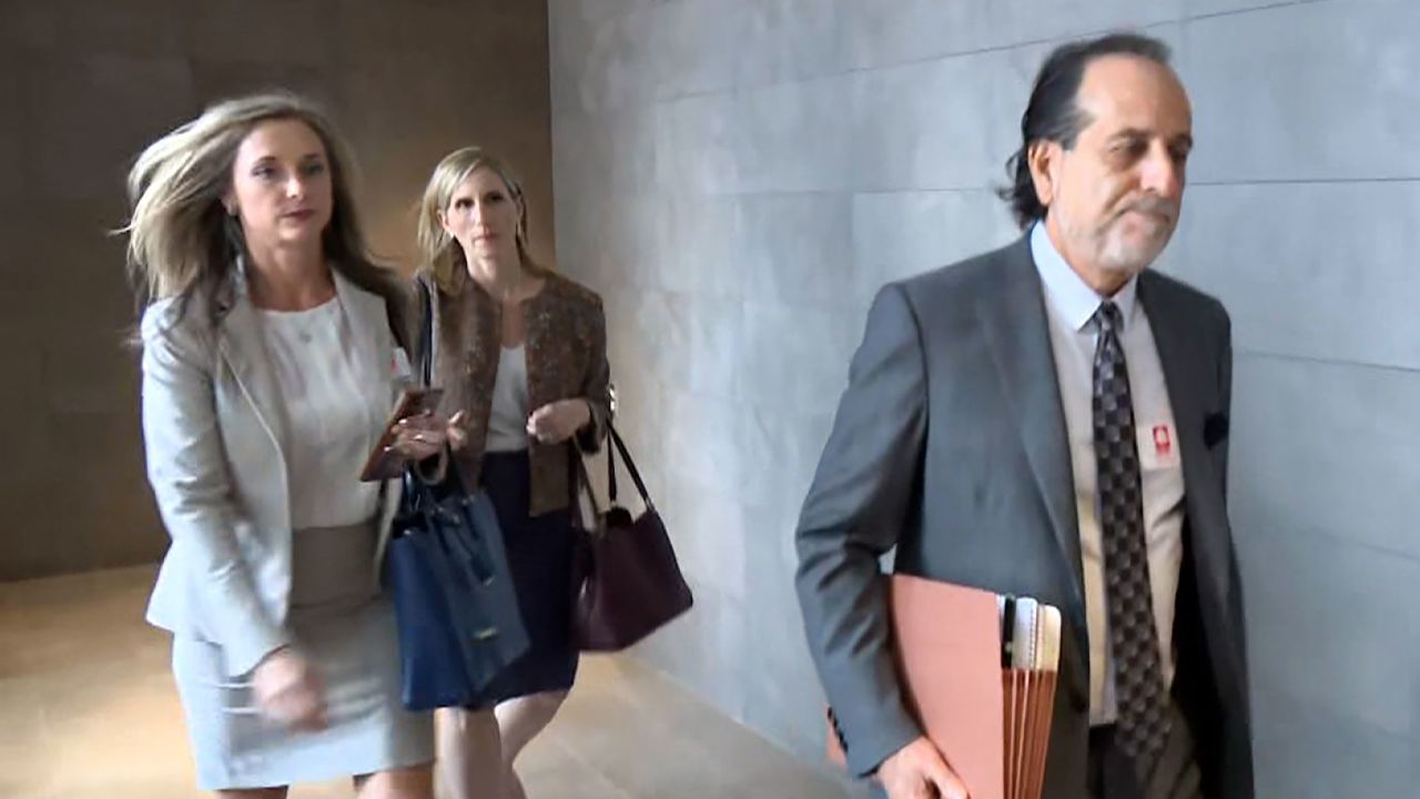 Donald Trump’s legal team leaves the Fulton County courthouse on Aug. 21 in Atlanta.