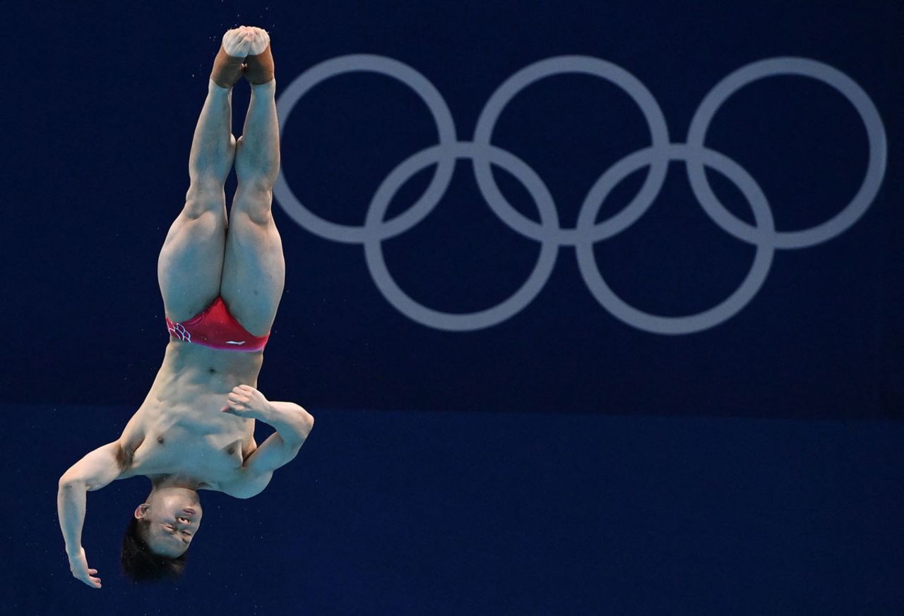 China's Xie Siyi competes in the men's 3 meter springboard diving final.