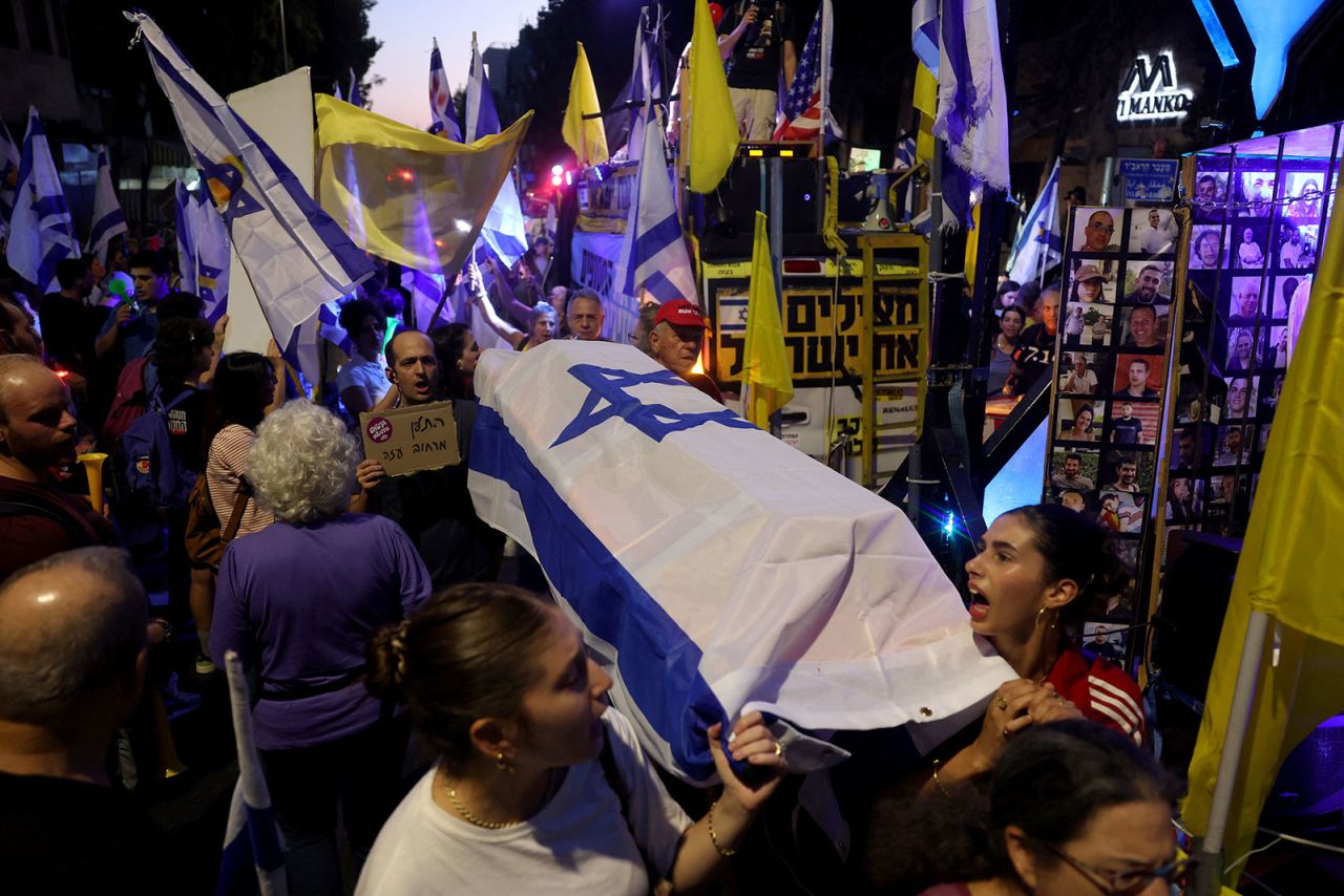 People attend a demonstration near Israeli Prime Minister Benjamin Netanyahu's residence in Jerusalem on Monday.