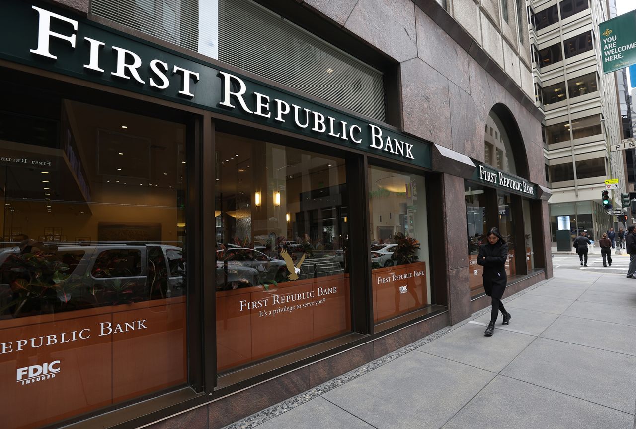 A pedestrian walks by the First Republic Bank headquarters on March 13 in San Francisco, California.?