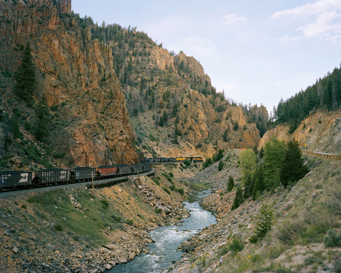 Kurland often photographs trains within the American landscape, winding in and out of it or disappearing into its vastness.