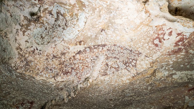 A cave drawing of human figures and a pig is the world’s oldest known narrative art | CNN