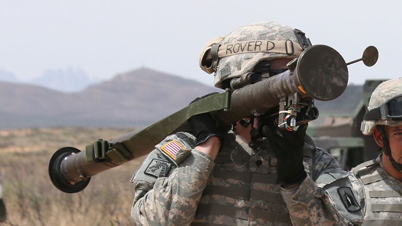A Florida Guardsmen from 3rd Battalion, 265th Air Defense Artillery Regiment, carries a shoulder mounted stinger missile launcher at McGregor Range, New Mexico, in April 2009.