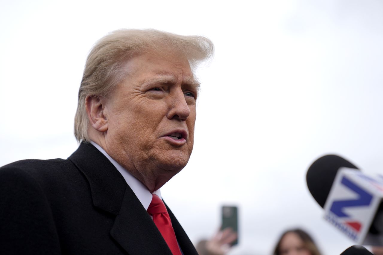 Republican presidential candidate and former President Donald Trump addresses members of the press during a campaign stop in Londonderry, New Hampshire on Tuesday, January 23.